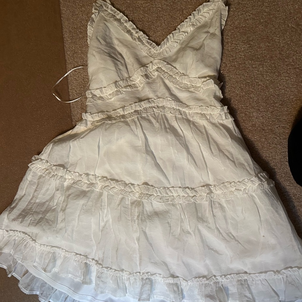 Francesca’s Elegant White Ruffled Dress
